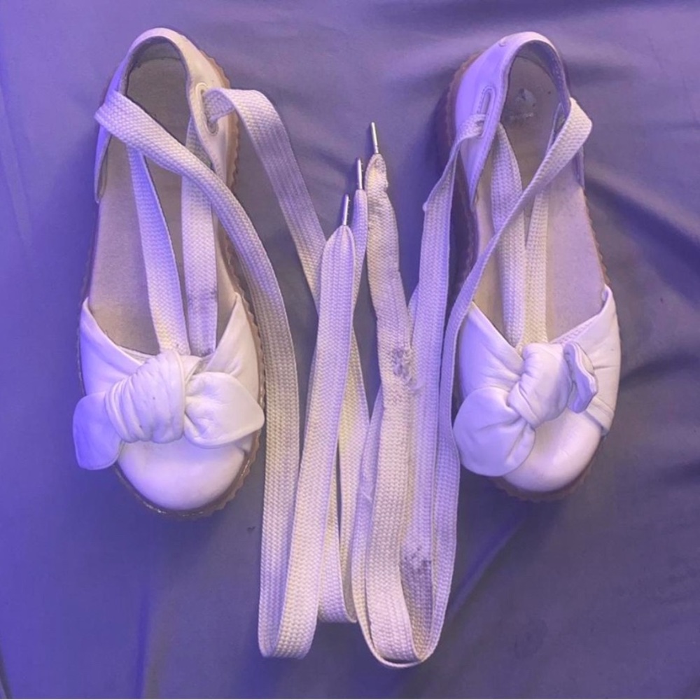 White sandel with laces to tie around your leg